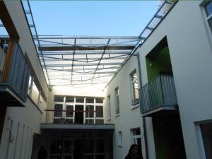  alt="Maison Biloba, un concept novateur au cœur de Schaerbeek, commune au nord de Bruxelles."